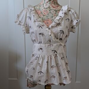 Anthropologie Raccoon Peplum Top